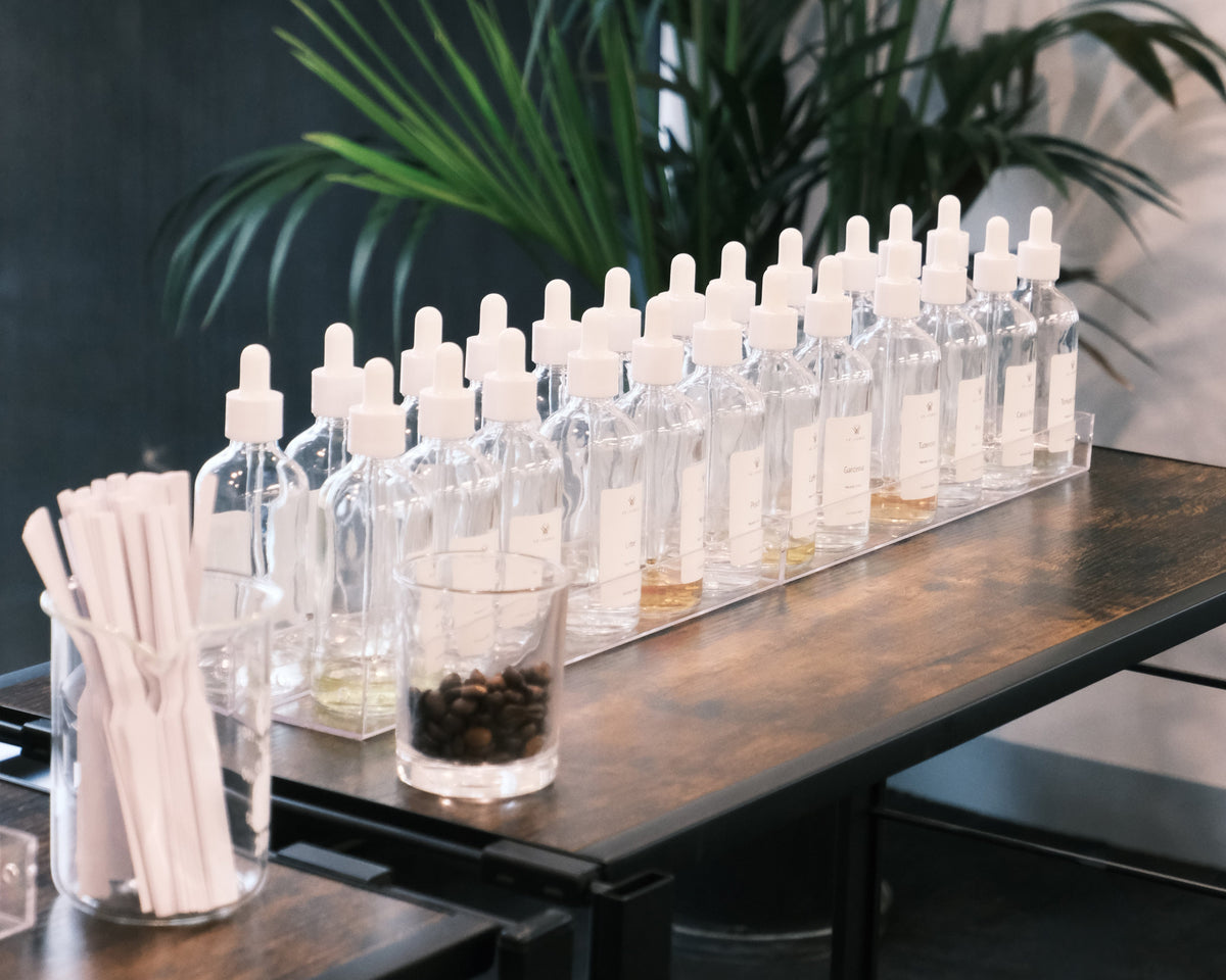Row of clear dropper bottles