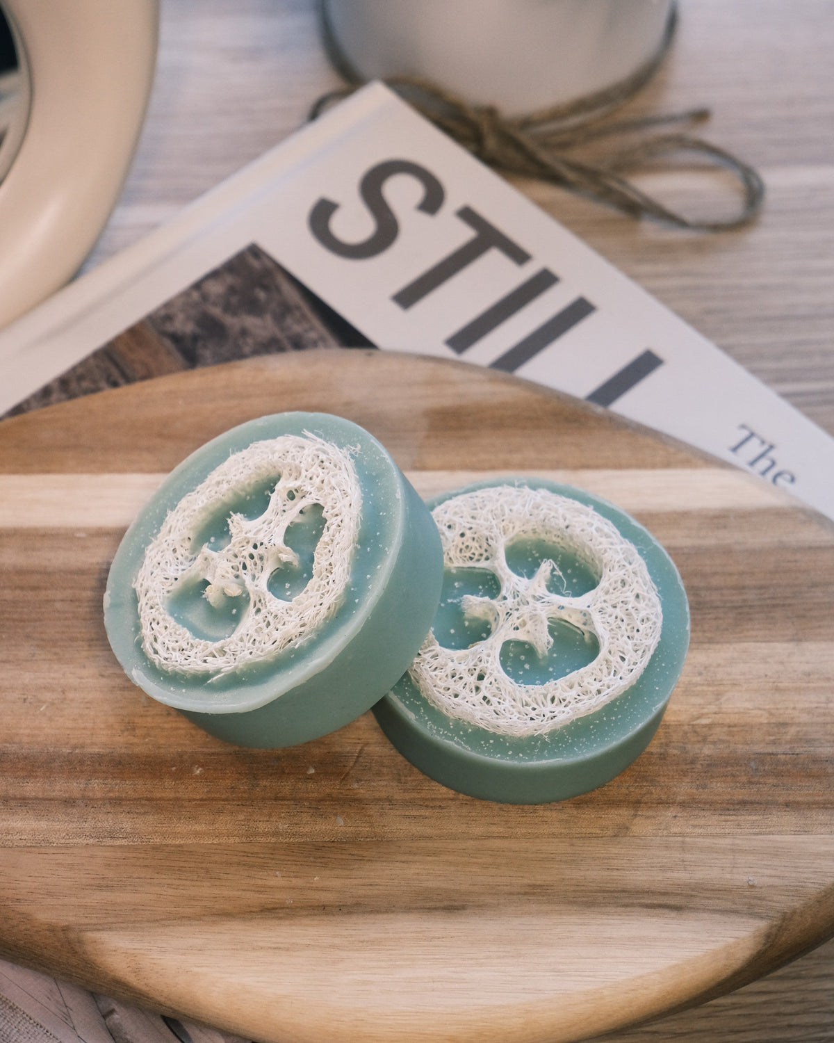 Two green loofah sponges