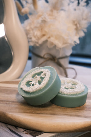 Two green soap bars