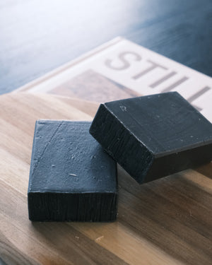 Two square-shaped black bars