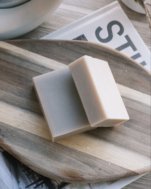 Bar of soap on a wooden tray