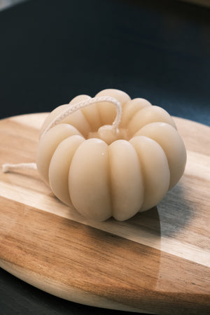 Beige sea sponge on a wooden board 
