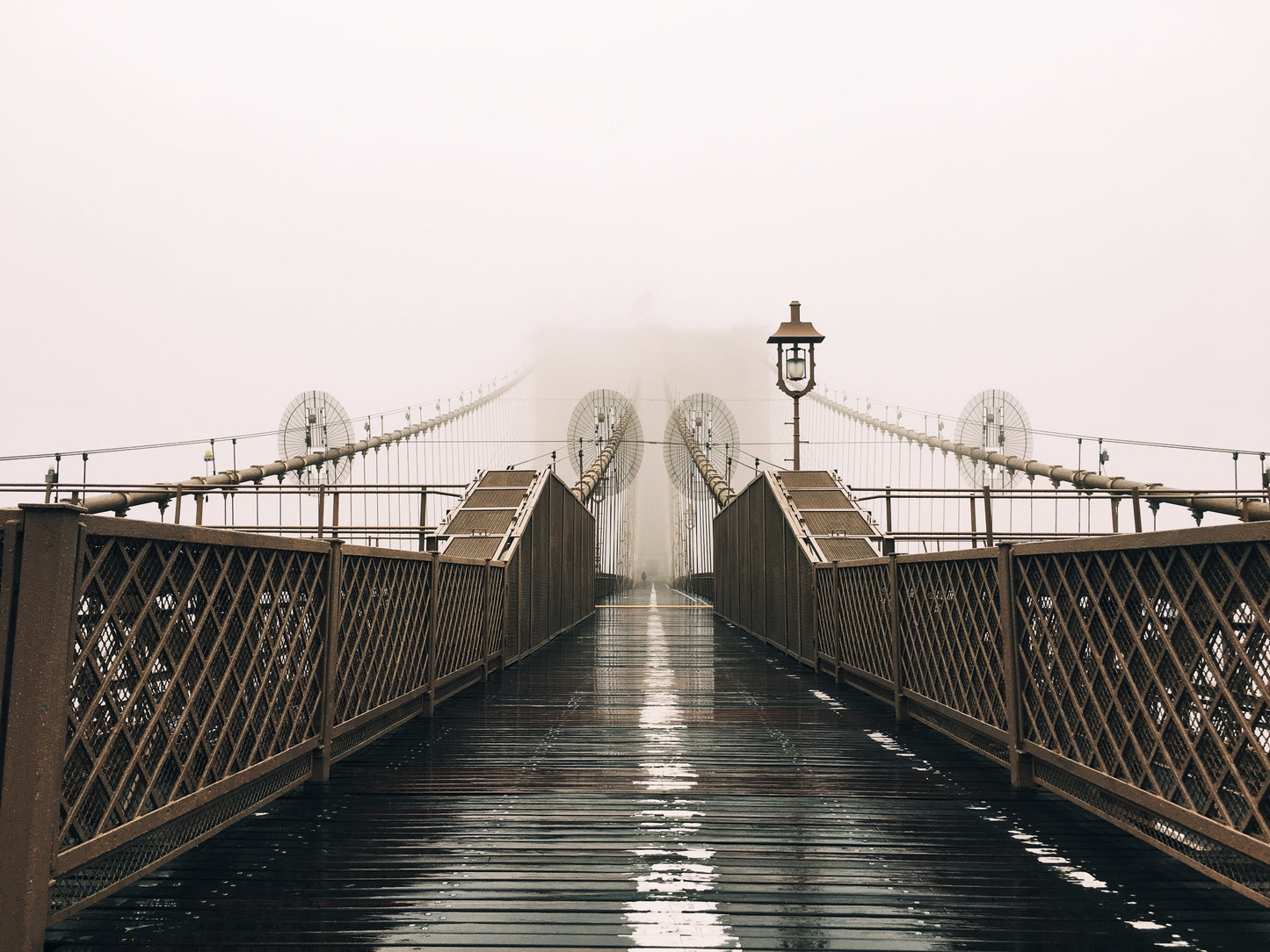 a-wet-bridge-covered-in-fog